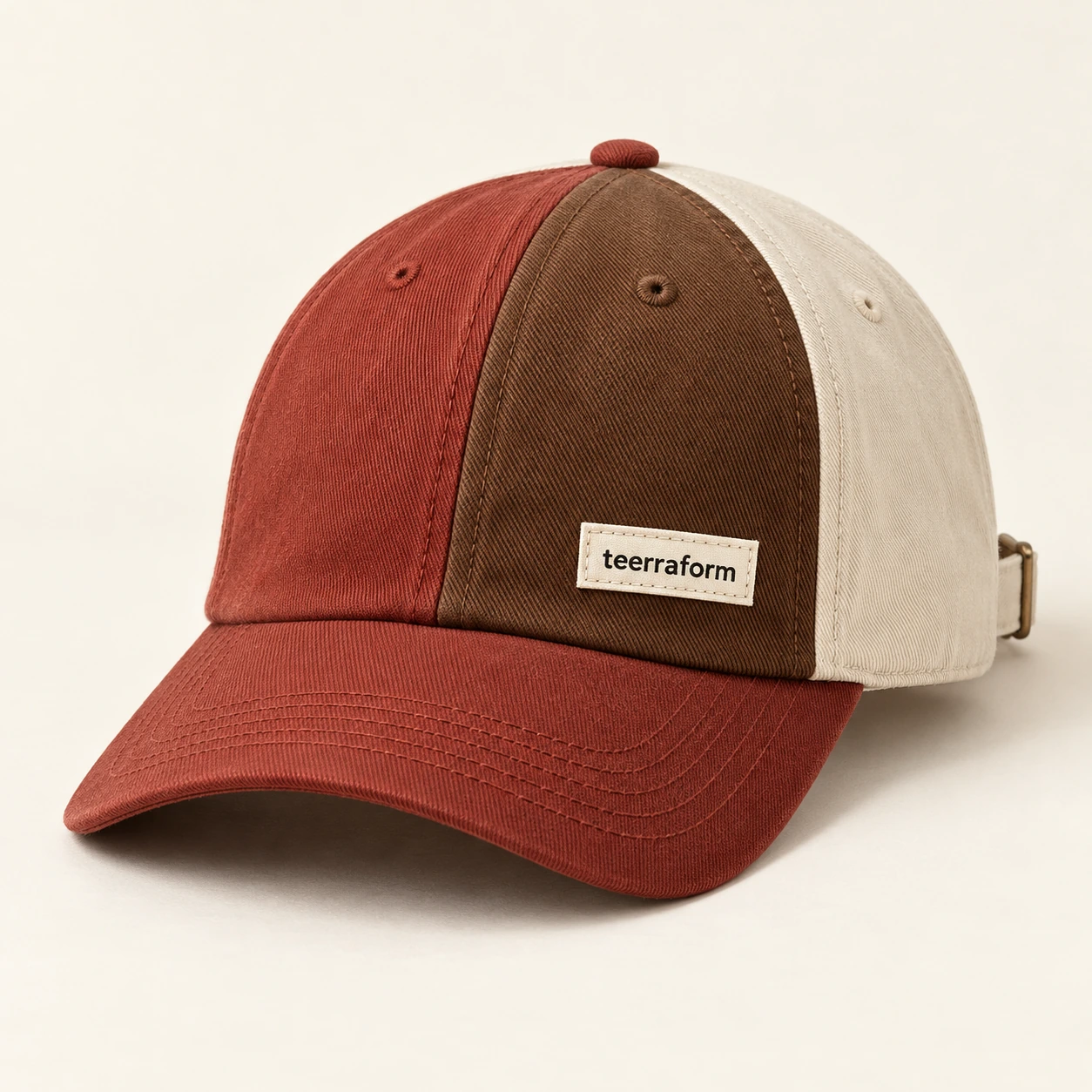 Rust County patchwork cap in brick red, tobacco brown, ivory